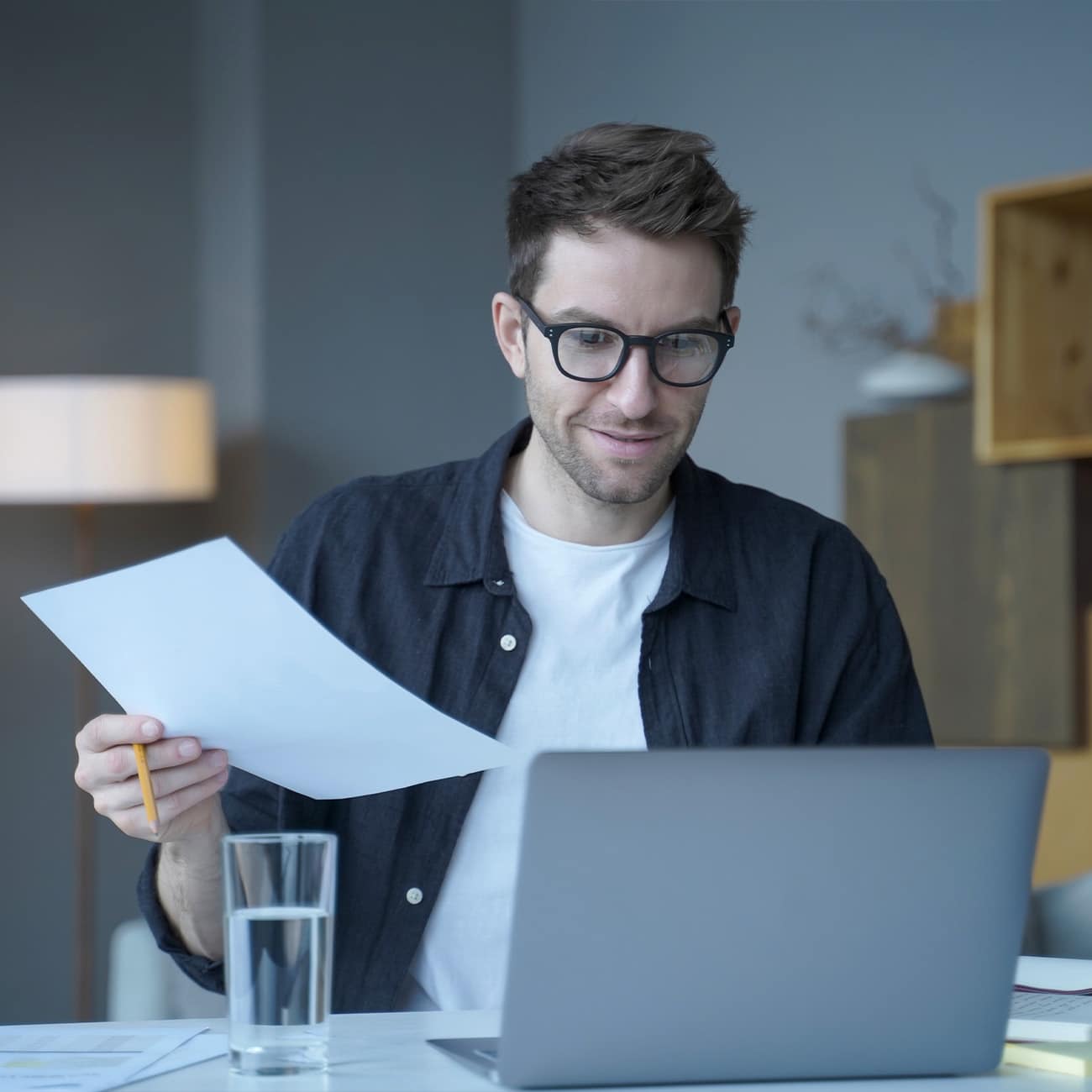 man preparing documents for divorce online